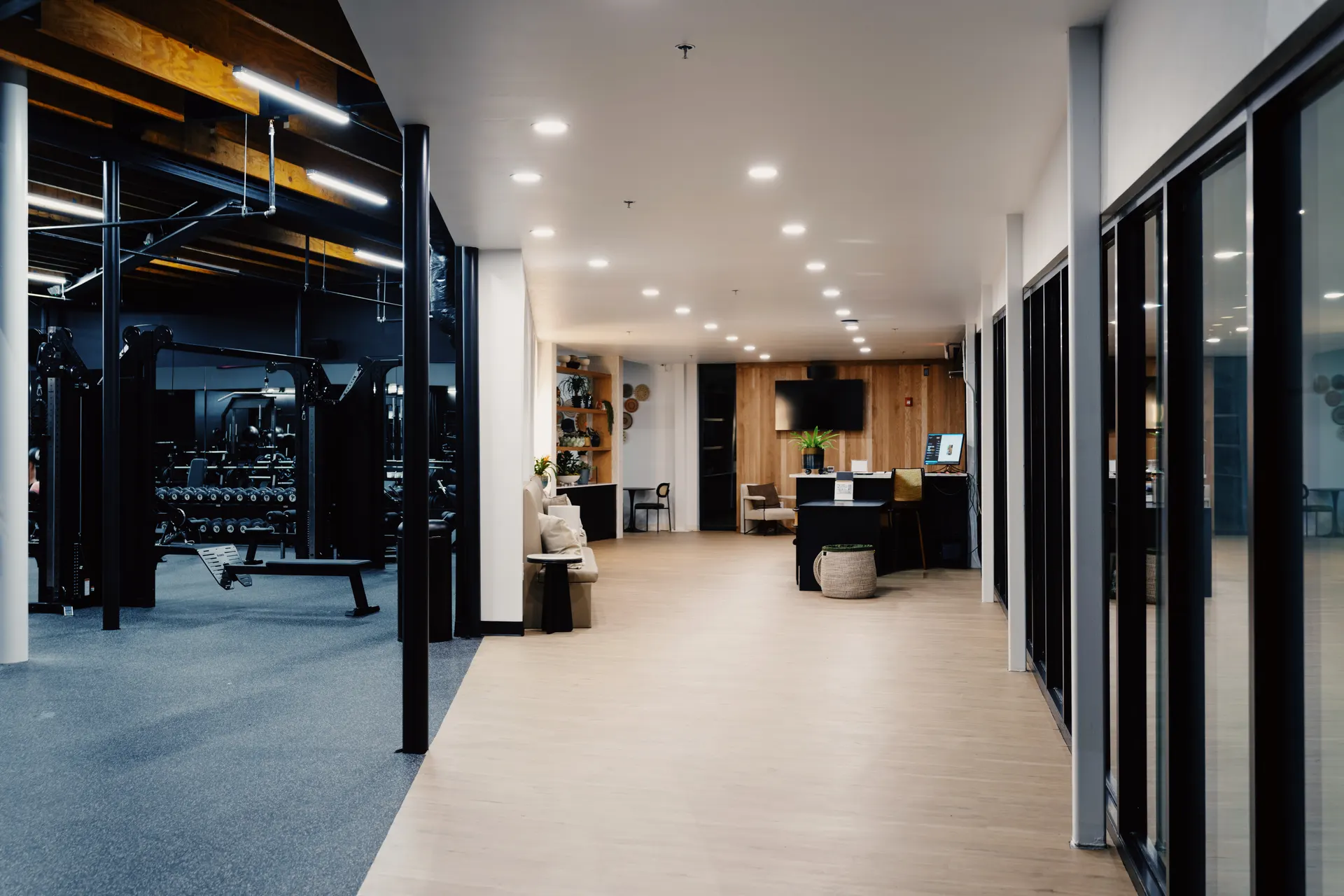 Walking into THIS Gym — the front desk and main floor