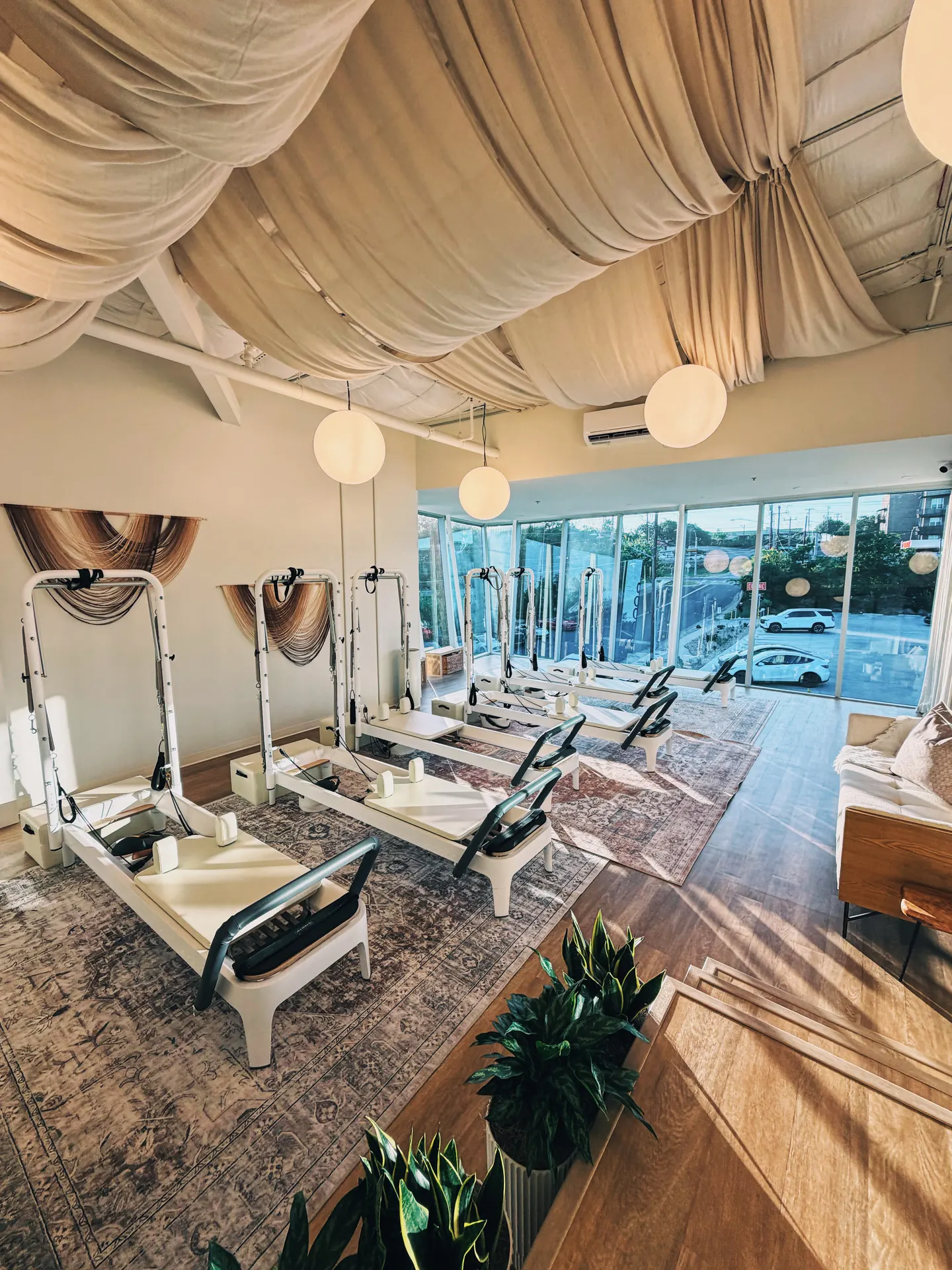 Reformer Pilates studio with Balanced Body reformers and towers at THIS Gym in South Austin